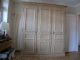 Armoire vestiaire en epicea, teinte, et cire, avec ferrures en fer forge